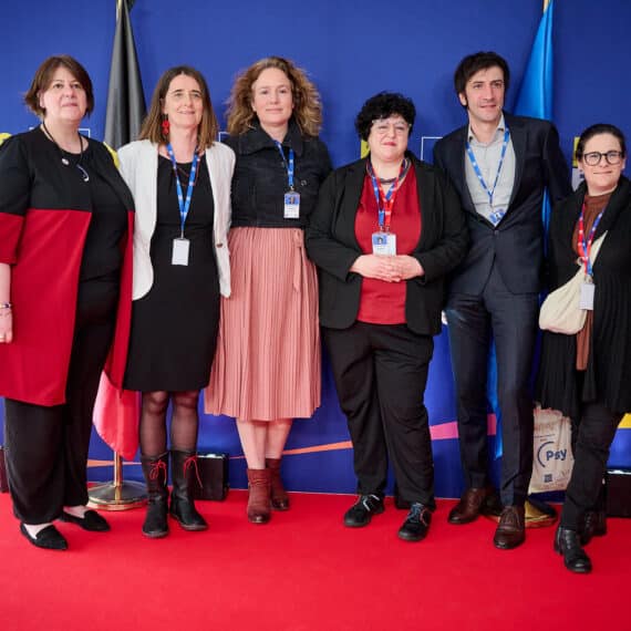 Delegates of Social Platform standing for an official group photo at La Hulpe conference